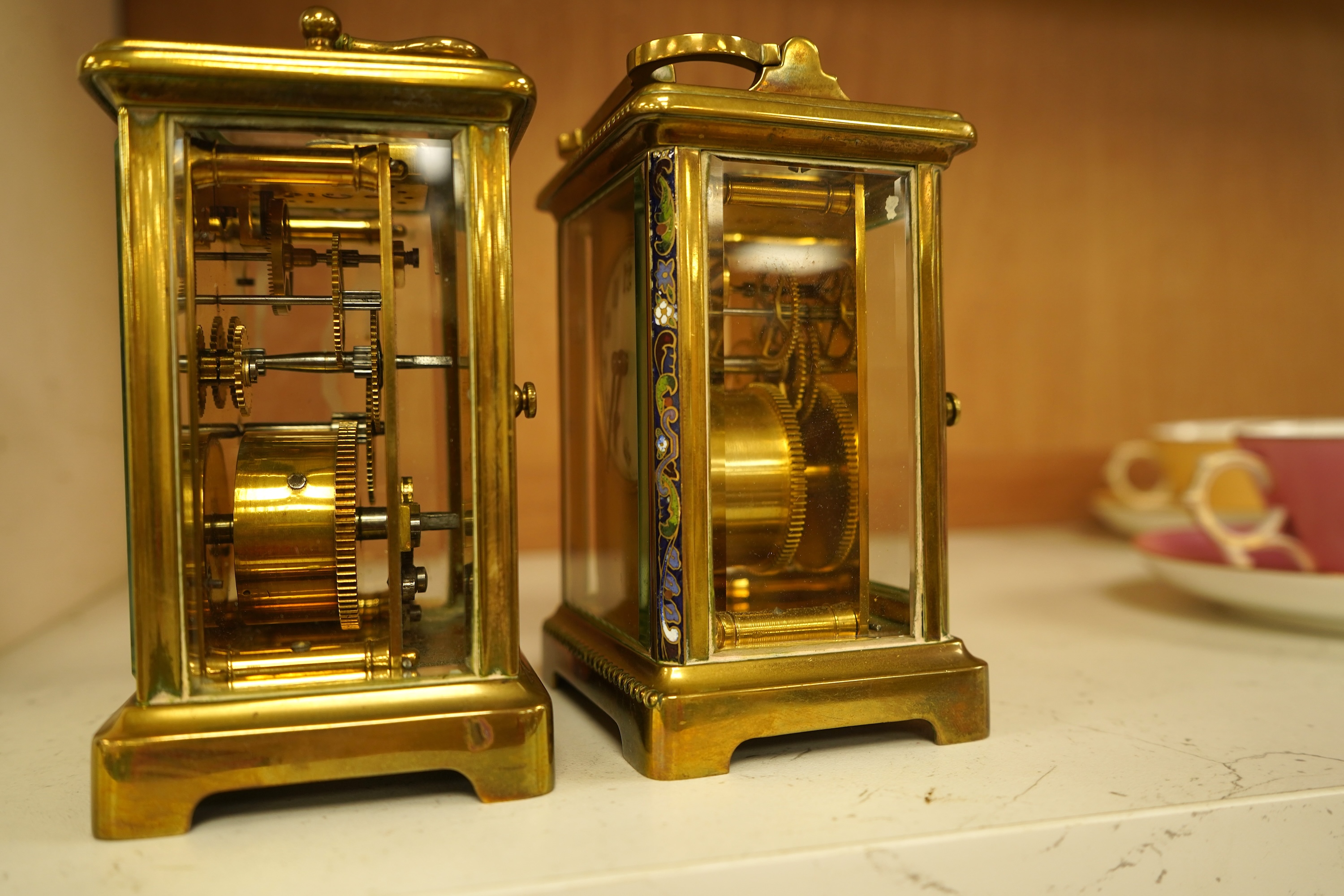A lacquered brass champleve enamel carriage timepiece and one other, no keys, largest 15cm high